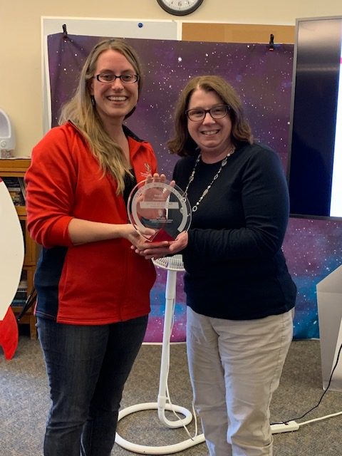 Photo of Karla Weber and Heidi Johnson holding their award