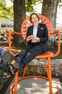 Dean of Student Christina Olstad sits in a large Union chair