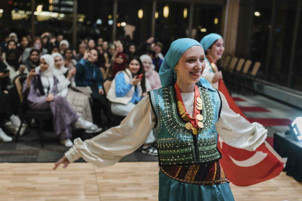 Ece Kilic and Melisa Erman displaying their traditional Turkish Clothing in the fashion show