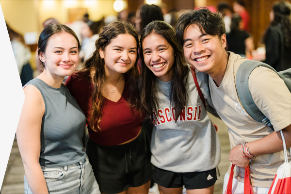 Group of students gather for a photo at an event