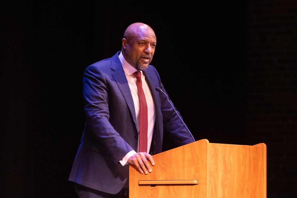 Provost Isbell speaks at a podium