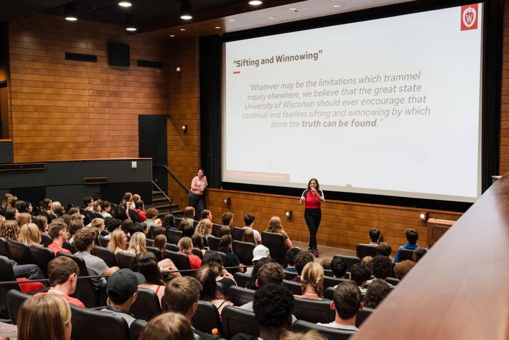 UW-Madison Dean of Students, Christina Olstad, and Vice Chancellor for Student Affairs, Fernie Rodriguez, address incoming Badgers during SOAR 2025, highlighting UW-Madison’s commitment to the ideals of “Sifting and Winnowing” a guiding principle of UW-Madison education.