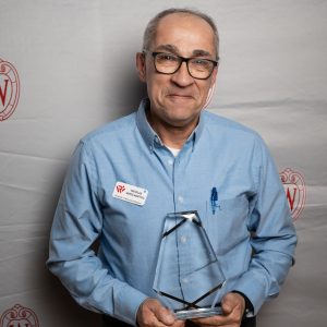 Nicolas Munoz-Montoya poses with their award.