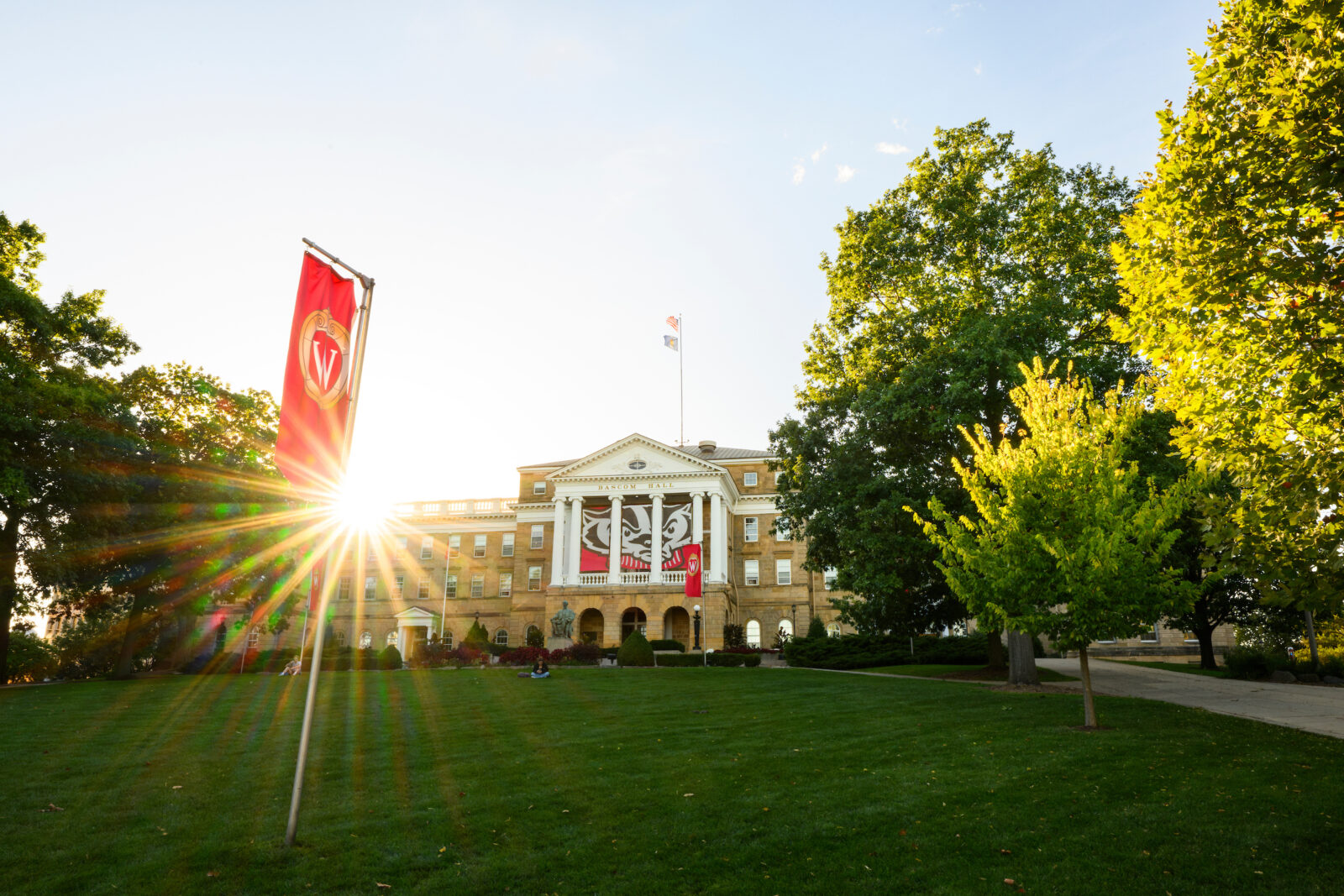 The sun shines at the back of Bascom Hall